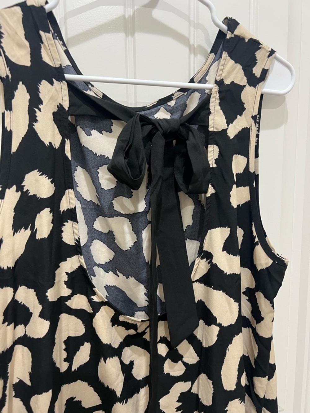 Sleeveless Black and Cream Animal Print Swing Dress - Picture 3 of 5